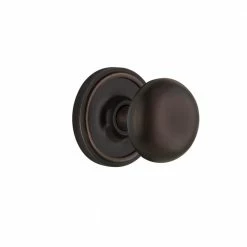 Nostalgic Warehouse Classic Rosette Single Dummy New York Door Knob in Timeless Bronze