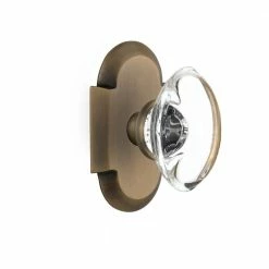 Nostalgic Warehouse Cottage Plate Single Dummy Oval Clear Crystal Glass Door Knob in Antique Brass