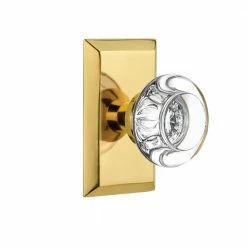 Nostalgic Warehouse Studio Plate Double Dummy Round Clear Crystal Glass Door Knob in Polished Brass