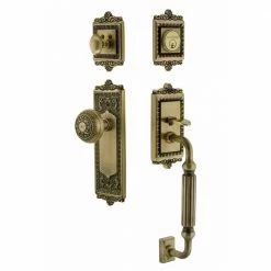 Nostalgic Warehouse Egg and Dart Plate 2-3/8 in. Backset Antique Brass F Grip Entry Set Egg and Dart Knob