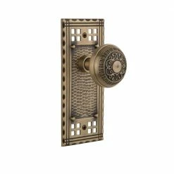Nostalgic Warehouse Craftsman Plate 2-3/8 in. Backset Antique Brass Passage Hall/Closet Egg and Dart Door Knob