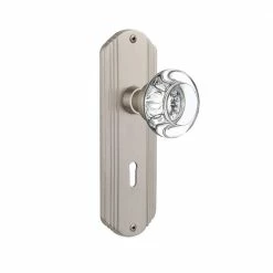 Nostalgic Warehouse Deco Plate with Keyhole 2-3/8 in. Backset Satin Nickel Privacy Bed/Bath Clear Crystal Glass Door Knob