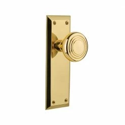 Nostalgic Warehouse New York Plate 2-3/8 in. Backset Polished Brass Privacy Bed/Bath Deco Door Knob