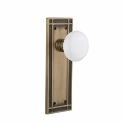 Nostalgic Warehouse Mission Plate 2-3/4 in. Backset Antique Brass Privacy Bed/Bath White Porcelain Door Knob