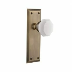 Nostalgic Warehouse New York Plate 2-3/8 in. Backset Antique Brass Privacy Bed/Bath Waldorf White Milk Glass Door Knob